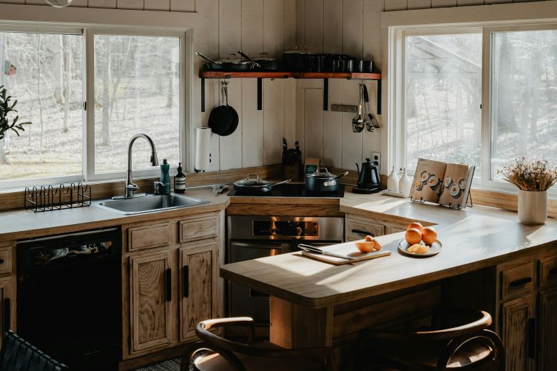 Rustic wooden kitchen cabinet design with bulky doors, outdated compared to sleek modern kitchen cabinet trends in 2025.