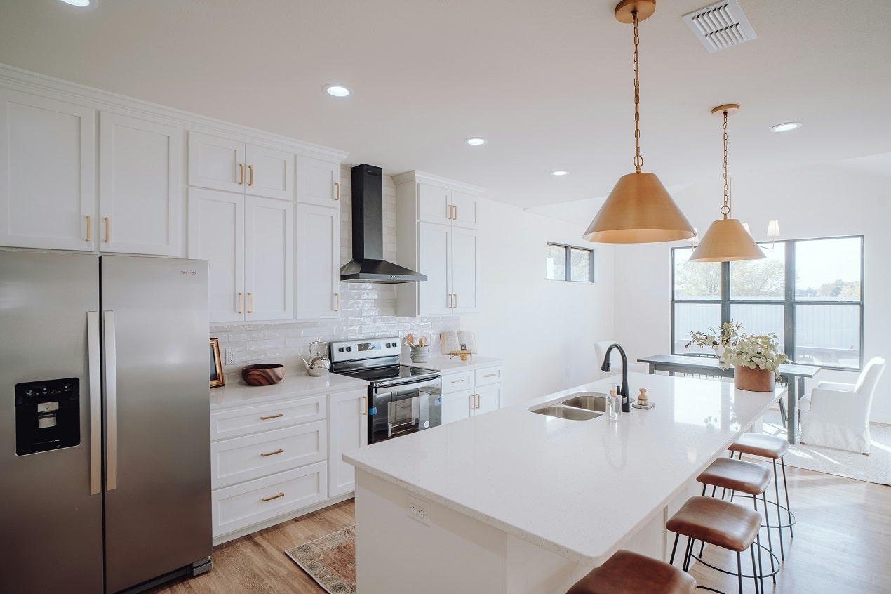 Bright modern kitchen showing layout details for refreshing a kitchen, bathroom, or patio before buying materials.